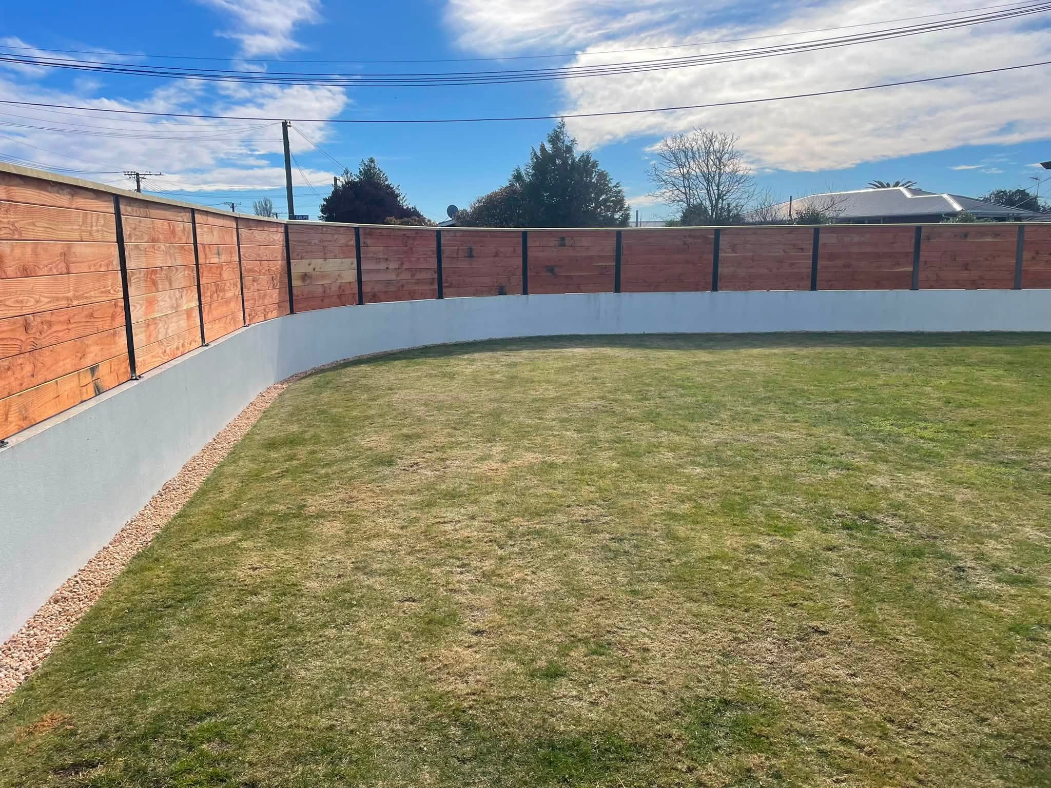 Completed timber boundary fence viewed from inside the property